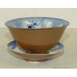 An Oriental Trumpet Shape Tea Bowl on brown,