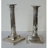 A Pair Sheffield Silver Corinthian Column Candlesticks having chamfer stems,