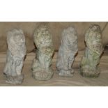 4 Garden Figures of Seated Lions,