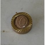 A 9ct Gold Circular Pendant Mounted with old 10 schilling note