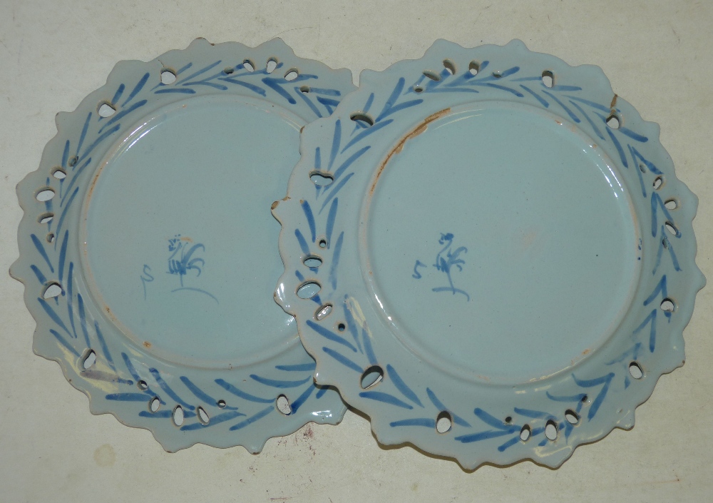 A Pair of Continental Blue and White Round Scalloped Delft Plates having pierced rim with cupids, - Image 2 of 2