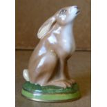 A Halcyon Days China Figure of a rabbit on oval base,