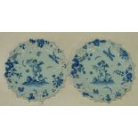 A Pair of Continental Blue and White Round Scalloped Delft Plates having pierced rim with cupids,