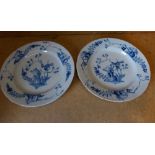 A Pair of Antique Delft Blue and White Plates with bird branch, floral and scroll decoration, 22.