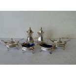 A Mappin & Webb 3-Peice Silver Plated Condiment Set having gadroon rims on splayed feet,