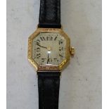 A Ladies 9ct Gold Wrist Watch having silvered dial with Arabic numerals,