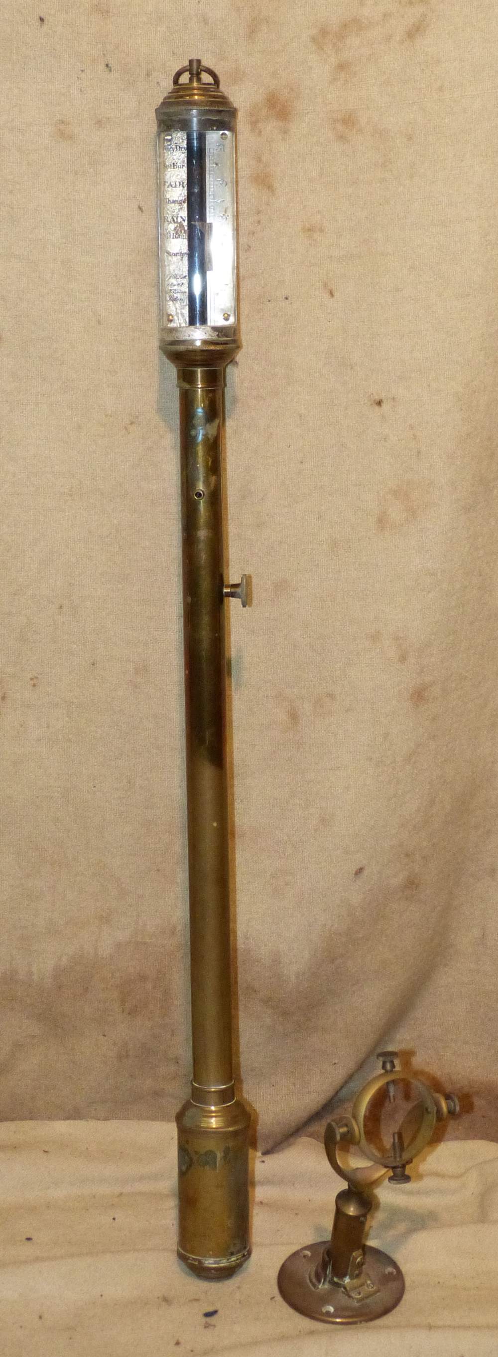 A Brass Cylindrical Stick Marine Barometer with bracket,