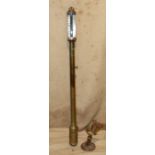 A Brass Cylindrical Stick Marine Barometer with bracket,