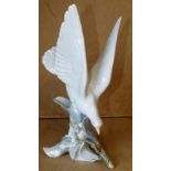 A Lladro Figure of a dove (foot a/f) 29.