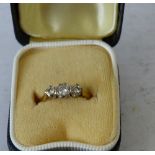 A Ladies Gold Ring set with 3 x diamonds