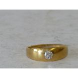 A Gold Gypsy Ring set with solitaire diamond, approximately 0.
