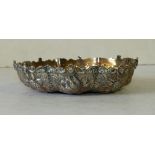 A Victorian Silver Round Shallow Sweetmeat Dish having crinkled rim with all over embossed floral,