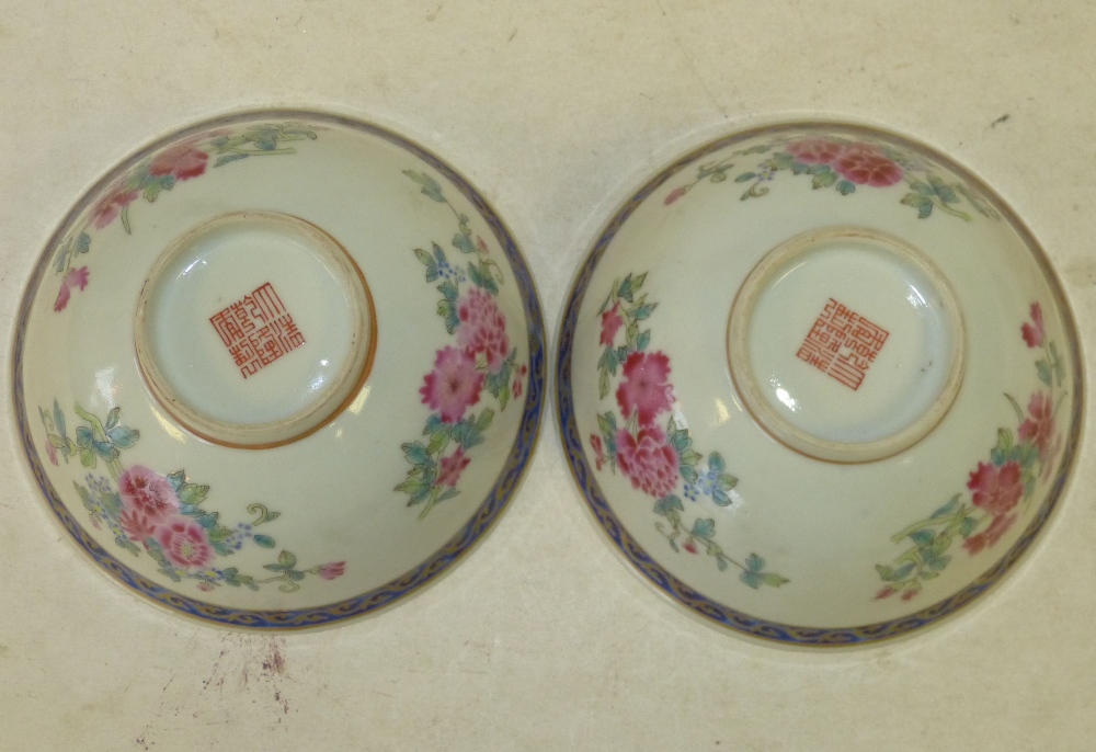 A Pair of Oriental Round Trumpet Shape Bowls on white and blue ground with multicoloured floral, - Image 2 of 2