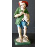 An 18th/19th Century Later Painted Polychrome Carved Wooden Figure of a gentlemen holding a sheep