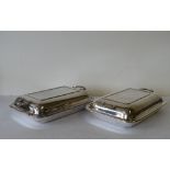 A Pair of Silver Plated Rectangular Entree Dishes with covers (4)