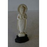 An Eastern Carved Ivory Figure of a Goddess on ebonised base, 13.