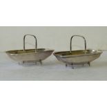 A Pair of Sheffield Silver Sweetmeat Dishes in form of baskets having fixed overhead handles, 11.