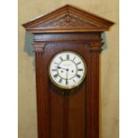 Camerer Cuss & Co London  Vienna  8 Day Striking Wall Clock having reeded column supports oval