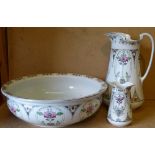 An Art Nouveau Style 3-Piece China Toilet Set, comprising water jug, basin and toothbrush holder,
