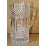 A Heavy Cut Glass Cylindrical Water Jug with tooth cut decoration,