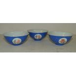 A Set of 3 Oriental Round Trumpet Shape Bowls on blue and white ground with dragon and phoenix