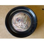 A Victorian China Pot Lid "The Game Bag" in ebony frame,