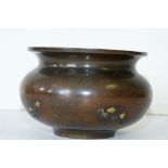 An Oriental Bronze Bulbous Thin Neck Trumpet Shape Censor having raised snail,