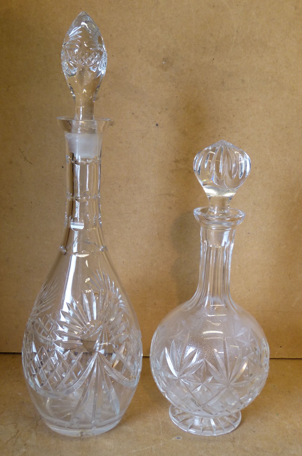 A Cut Glass Bulbous Thin Necked Decanter with stopper, 39cm high,