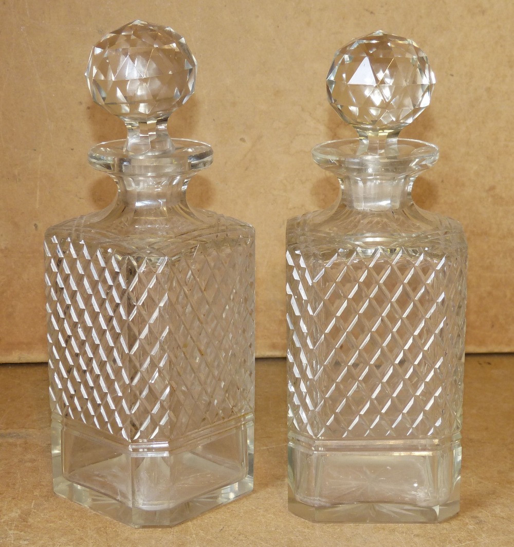 A Pair of Cut Glass Square Decanters with stoppers (1 stopper base a/f) 23cm high