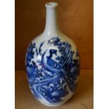 An Oriental Large Bulbous Thin Necked Vase on blue and white ground with floral,