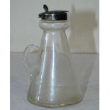 A Glass and London Silver Mounted Whiskey Jug having hinged lid,