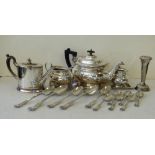 A 19th Century Silver Plated Oval Teapot having wooden scroll handles and pierced splayed base,