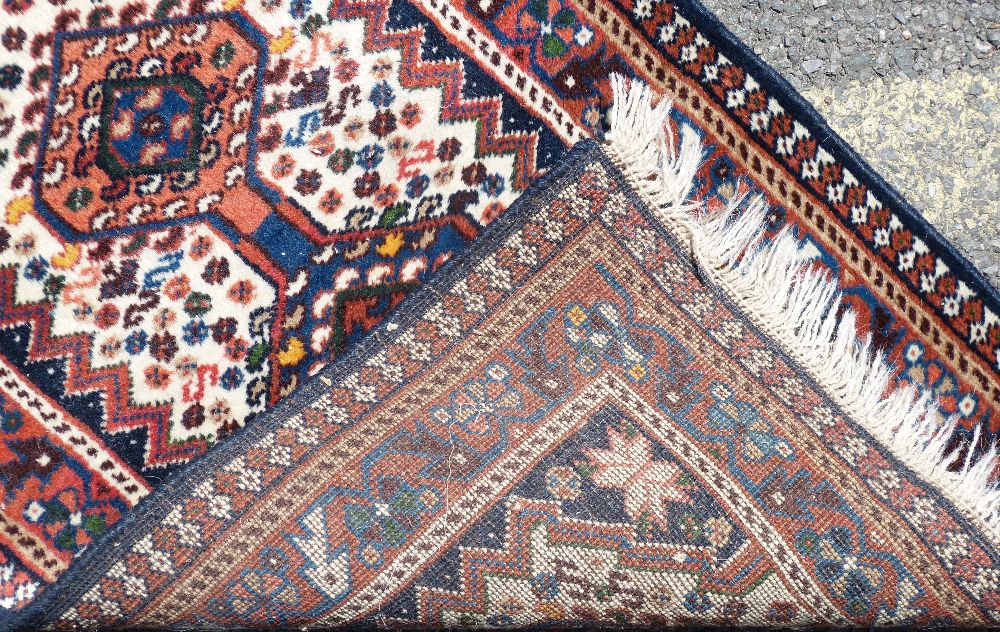 A Small Persian Prayer Rug on white, red and blue ground having 3 centre medallions, - Image 2 of 2
