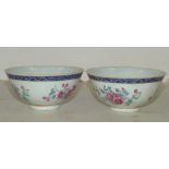 A Pair of Oriental Round Trumpet Shape Bowls on white and blue ground with multicoloured floral,