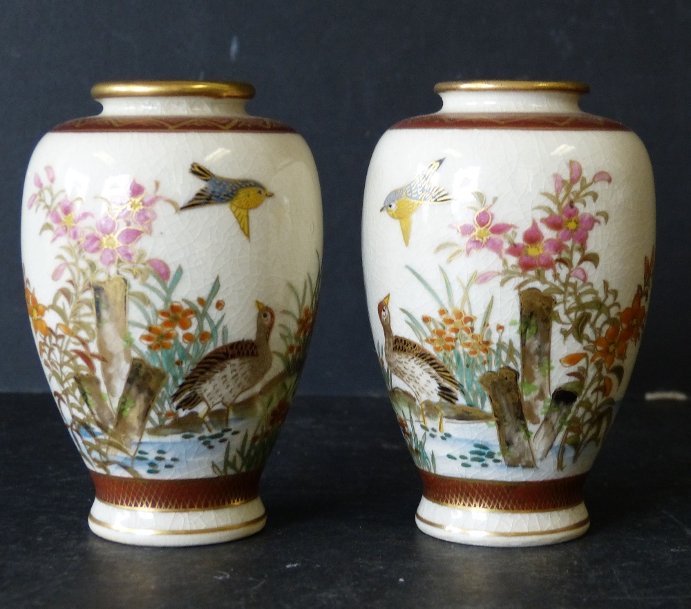 A Pair of Satsuma Miniature Bulbous Thin Necked Vases having multicoloured bird,