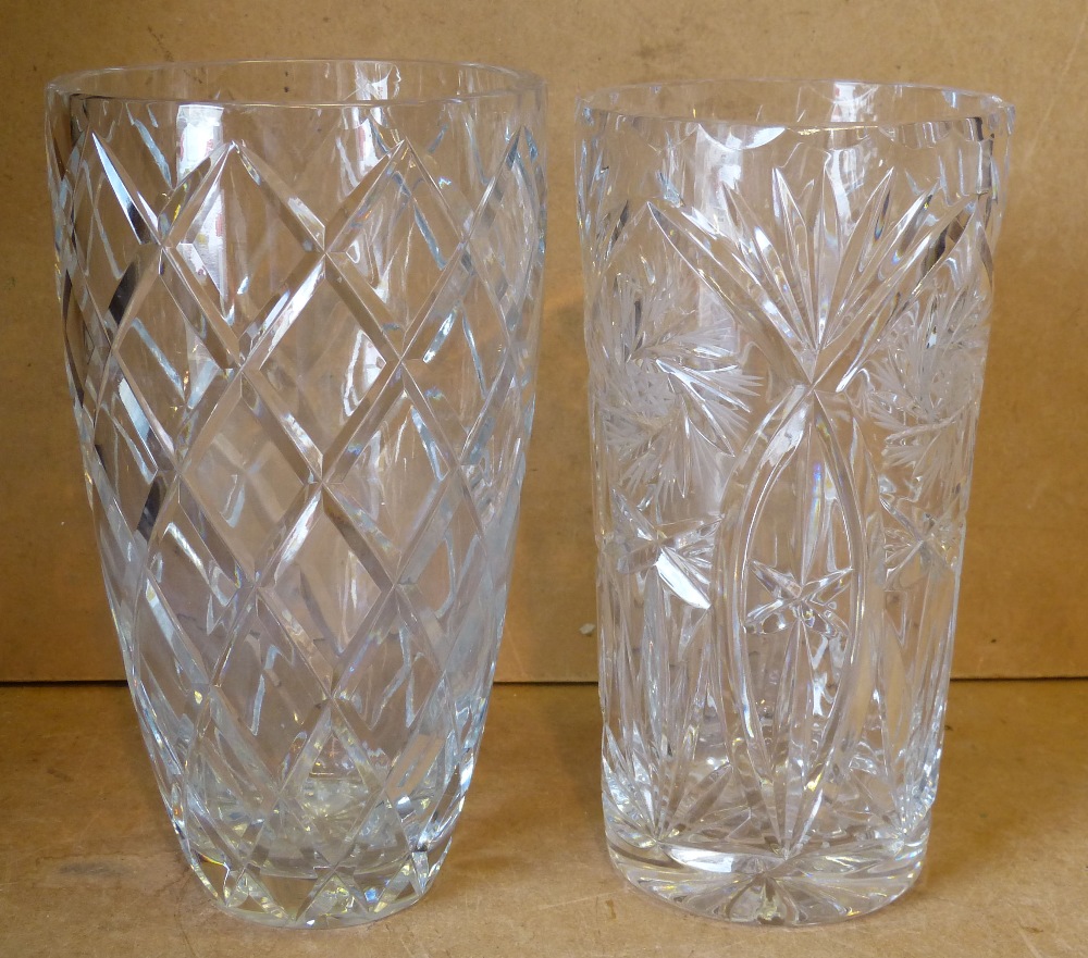 A Cut Glass Cylindrical Vase having thumb pattern rim with floral decoration, 24cm high,