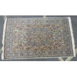 A Persian Rug on multicoloured ground having centre medallion,