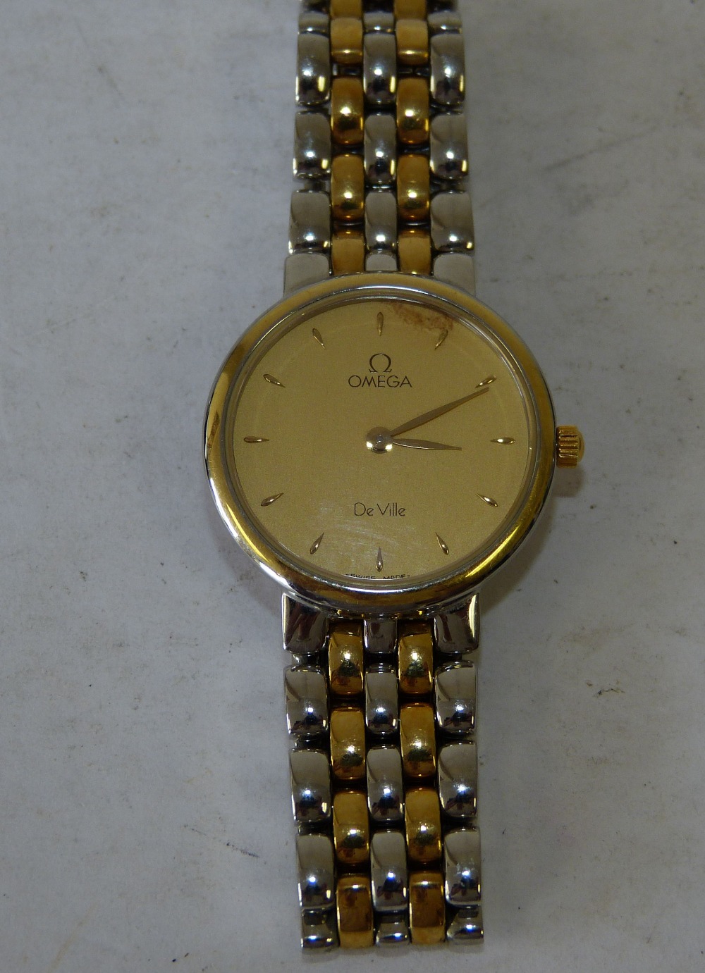 An Omega DeVille Ladies Circular  Wrist Watch having matching strap bracelet