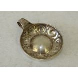 A Continental Silver Coloured Metal Tastevin having inner embossed ball decoration inscribed