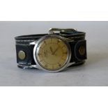 A Tissot Antimagnetique Gentlemen's Circular Wrist Watch with leather strap bracelet