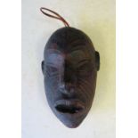 An African Clay Maskette, 10.