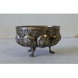 An Eastern Silver Coloured Metal Round Bowl having pierced and embossed animal,
