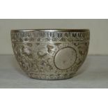 A Victorian Silver Round Sugar Bowl having all over embossed floral, leaf and scroll decoration,