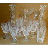 A Waterford Set of Drinking Glasses comprising, water jug, pair decanters with stoppers,