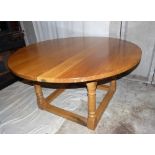 A Large Heavy Elm Round Dining Table on 4 x turned supports,