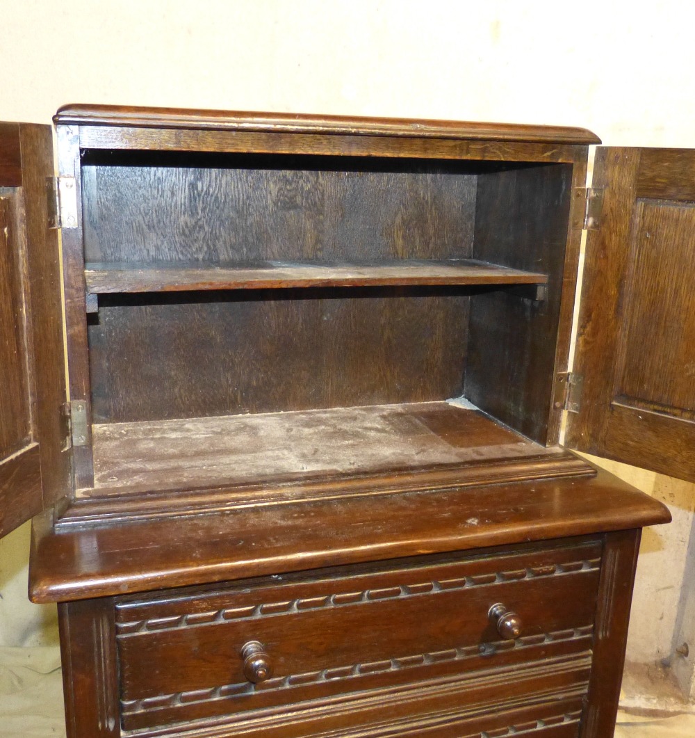 A Similar Oak Chest having 2 panelled doors with carved arched motifs above 3 long drawers with - Image 3 of 5