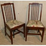 A Set of 4 Mahogany Stick Back Single Chairs having drop-in seats on square tapering fluted legs
