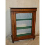 An 19th Century Walnut Pier Cabinet having inlaid floral and leaf stringing decoration,