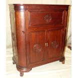 A Reproduction Oriental Hardwood Cocktail Cabinet having hinged top with fall front with fitted