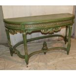 A Maples Green Painted Console Table having carved scroll and leaf decoration on round fluted